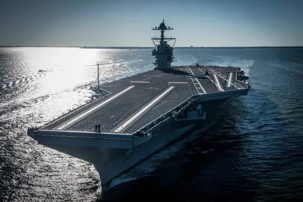 FILE - In this photo provided by the US Navy, the USS Gerald R. Ford embarked on the first of its sea trials to test various state-of-the-art systems on its own power for the first time, April 8, 2017, from Newport News, Va. (Mass Communication Specialist 2nd Class Ridge Leoni/US Navy via AP, File)