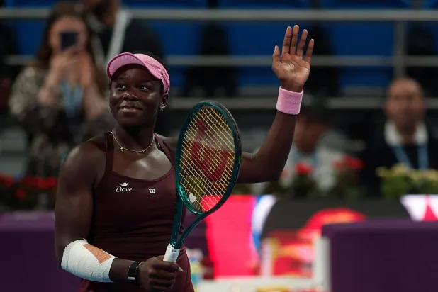 Canada's Victoria Mboko reacts after her women's singles quarter-final match against Kazakhstan's Elena Rybakina at the Qatar Open tennis tournament in Doha on February 12, 2026. (AFP)