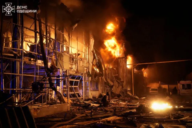 Firefighters work at the site of a Russian drone strike, amid Russia's attack on Ukraine, in Odesa, Ukraine in this handout picture released February 13, 2026. Press service of the State Emergency Service of Ukraine in Odesa region/Handout via REUTERS 