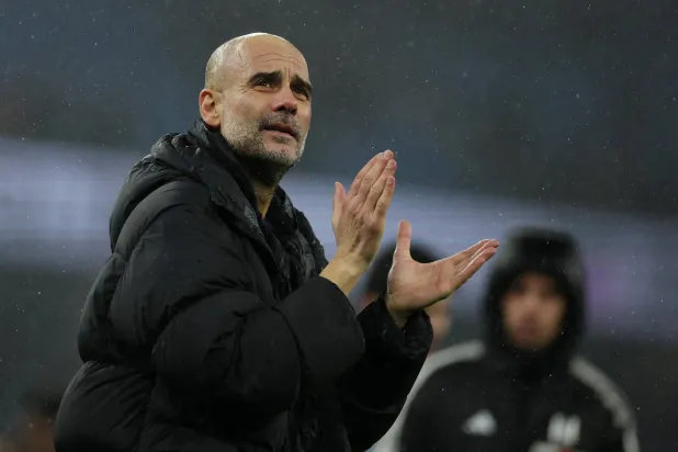 Football - Premier League - Manchester City v Fulham - Etihad Stadium, Manchester, Britain - February 11, 2026 Manchester City manager Pep Guardiola applauds fans after the match. (Reuters)
