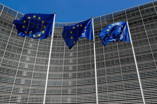 FILE PHOTO: European Union flags flutter outside the EU Commission headquarters in Brussels, Belgium June 20, 2018. REUTERS/Yves Herman/File Photo