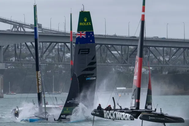 Black Foils SailGP Team helmed by Peter Burling and DS Automobiles SailGP Team France helmed by Quentin Delapierre collide during racing on Race Day 1 of the ITM New Zealand Sail Grand Prix in Auckland, New Zealand, Saturday, Feb. 14, 2026. (Andrew Baker/ SailGP via AP)