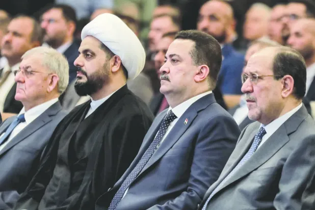 Irak Başbakanı Muhammed Şiya es-Sudani ve Nuri el-Maliki (AFP)