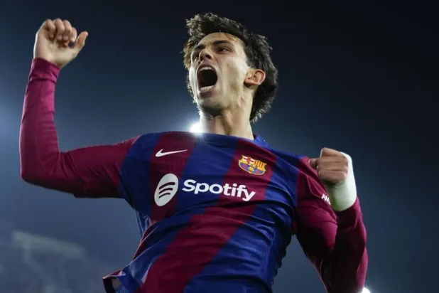 FC Barcelona's striker Joao Felix celebrates after scoring the 2-1 goal during the UEFA Champions League group H soccer match between FC Barcelona and FC Porto, in Barcelona, Spain, 28 November 2023. (EPA)
