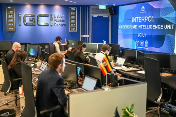 AFP was granted a look inside the global organization's multi-pronged cybercrime facility, where specialists pore through massive amounts of data. Roslan RAHMAN / AFP