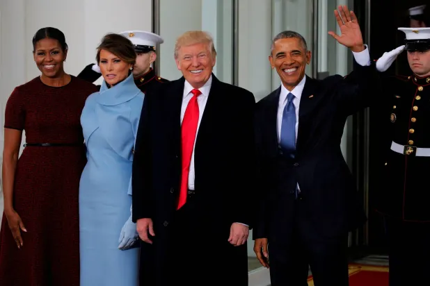 FILE PHOTO: US President Barack Obama (R) and first lady Michelle Obama (L) greet US President-elect Donald Trump and his wife Melania for tea before the inauguration at the White House in Washington, US January 20, 2017. REUTERS/Jonathan Ernst/File Photo