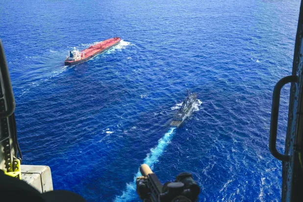 This photo posted on the X account of the US Department of Defense on February 15, 2026 shows what the Department of Defense says are US military forces preparing to interdict and board an oil tanker, the Veronica III, in the Indian Ocean. (Photo by Handout / US Department of Defense / AFP) 