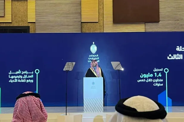 The Minister of Municipalities and Housing addresses attendees during the government press conference (Asharq Al-Awsat). 