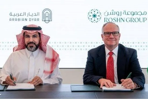 جانب من توقيع الاتفاقية (حساب روشن على منصة إكس)