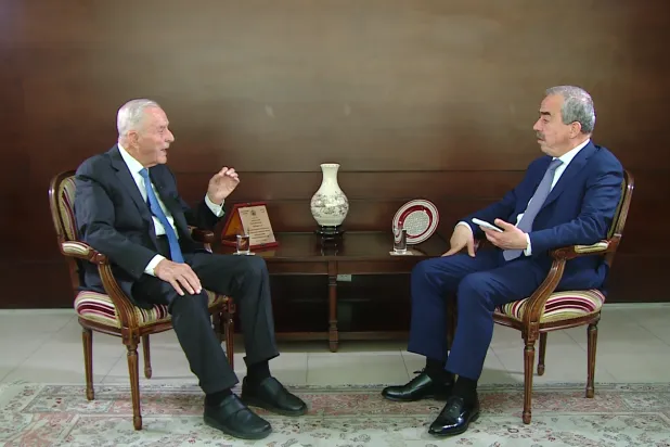 Ahmad Obeidat during the interview with Asharq Al-Awsat's Editor-in-Chief Ghassan Charbel in Amman. (Asharq Al-Awsat) 