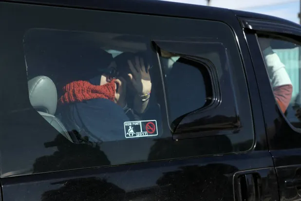 Members of Australian families believed to be linked to ISIS leave Roj camp near Derik, Syria February 16, 2026. REUTERS/Orhan Qereman