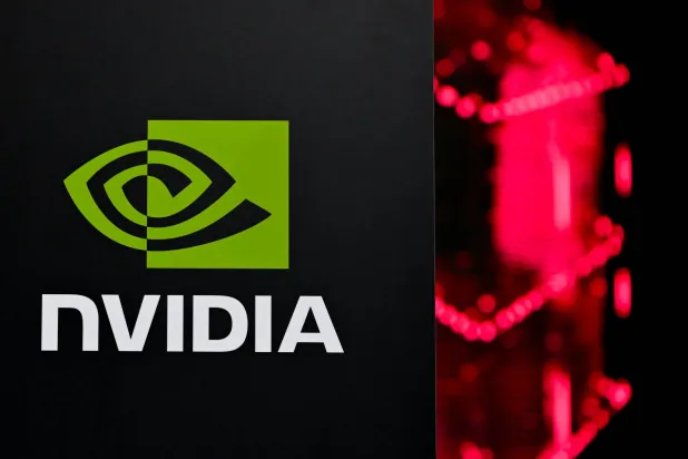 FILED - 04 February 2026, Bavaria, Munich: The NVIDIA logo is seen during a press conference at the opening of Telekom and NVIDIA's AI factory "Industrial AI Cloud". Photo: Sven Hoppe/dpa