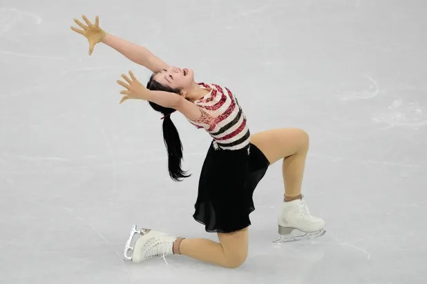 Ami Nakai of Japan competes during the women's short program figure skating at the 2026 Winter Olympics, in Milan, Italy, Tuesday, Feb. 17, 2026. (AP Photo/Ashley Landis)
