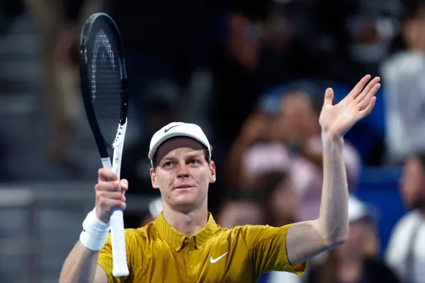  Italy's Jannik Sinner greets the fans after defeating Australia's Alexei Popyrin in their men's singles match at the Qatar Open tennis tournament in Doha on February 18, 2026. (AFP)