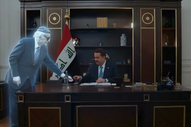 The late Iraqi poet Muhammad Mahdi al-Jawahiri serves tea to Prime Minister Mohammed Shia al-Sudani, as portrayed in a Ramadan advertisement