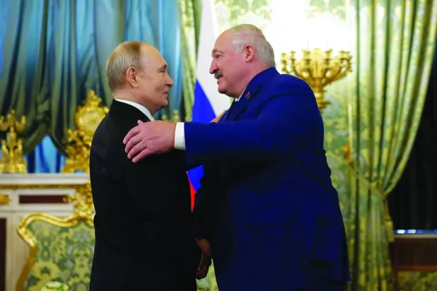 Putin, Moskova'da Belaruslu mevkidaşı Alexander Lukashenko ile bir araya geldi, (Arşiv-AP)