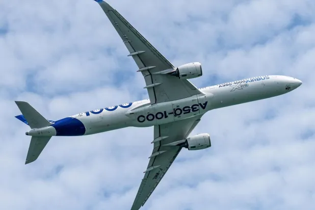 An Airbus A350-1000 at the Singapore Airshow on February 4. The company said Thursday it aims to deliver a record number of aircraft this year. Roslan RAHMAN / AFP/File
