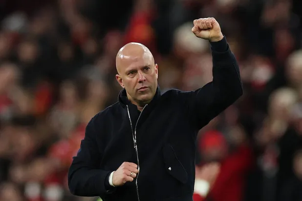 Soccer Football -  FA Cup - Fourth Round - Liverpool v Brighton & Hove Albion - Anfield, Liverpool, Britain - February 14, 2026 Liverpool manager Arne Slot celebrates after the match REUTERS/Phil Noble
