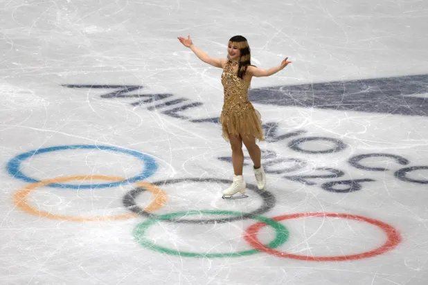 Milano Cortina 2026 Olympics - Figure Skating - Women Single Skating - Victory Ceremony - Milano Ice Skating Arena, Milan, Italy - February 19, 2026. Gold medallist Alysa Liu of United States celebrates after winning the Women Single Skating. (Reuters)