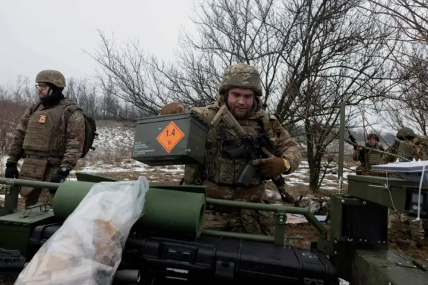 Ukrainian soldiers at an undisclosed location in Ukraine’s Zaporizhzhia region on January 30, 2026 (AFP)