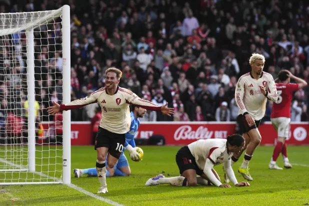 22 February 2026, United Kingdom, Nottingham: Liverpool's Alexis Mac Allister celebrates scoring their side's first goal during the English Premier League match between Nottingham Forest and Liverpool at the City Ground. Photo: Nick Potts/PA Wire/dpa