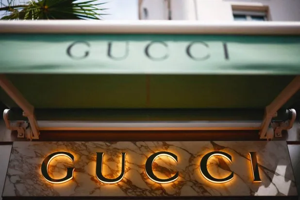 The logo of fashion house Gucci is seen outside a store in Cannes, France, May 16, 2024. (Reuters) 