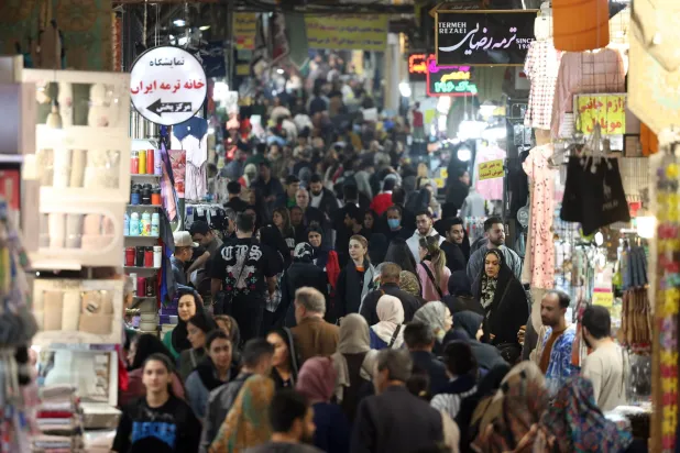 Iranians go shopping at the Tehran old grand bazaar in Tehran, Iran, 24 February 2026. (EPA)