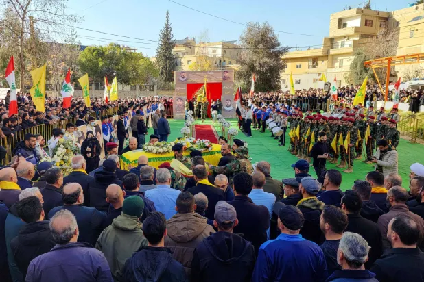Hezbollah supporters are seen during the funeral of slain member Hussein Yaghi in the eastern Bekaa, Lebanon. (AFP) 