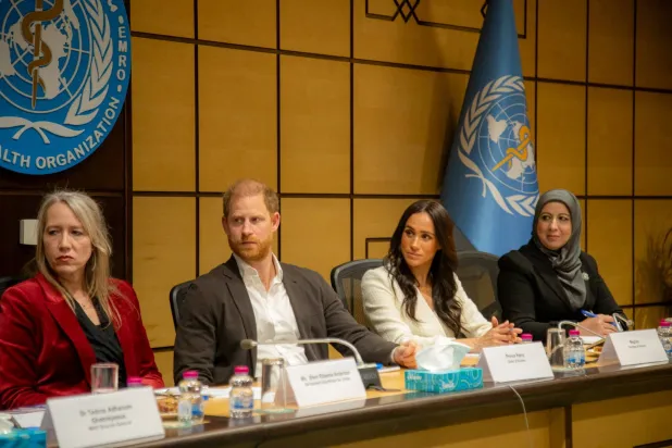 Britain's Prince Harry and Meghan, the Duke and Duchess of Sussex, attend a World Health Organisation roundtable hosted by Tedros Adhanom Ghebreyesus and regional WHO leadership, along with key donors and humanitarian partners, in Amman, Jordan, February 25, 2026. World Health Organisation (WHO)/Handout via REUTERS  