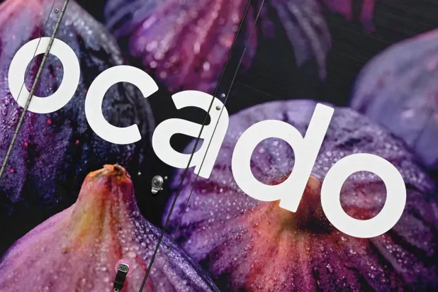 FILE PHOTO: An Ocado grocery delivery van is driven along a street in London, Britain, March 25, 2023. REUTERS/Toby Melville/File Photo