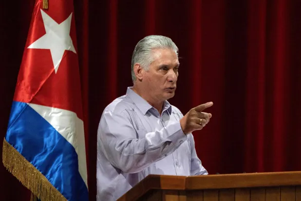 (FILES) Cuban President Miguel Diaz-Canel delivers a speech during the closing of the IV Conference "Nation and Emigration" at the Convention Palace in Havana on November 19, 2023. (Photo by YAMIL LAGE / AFP)