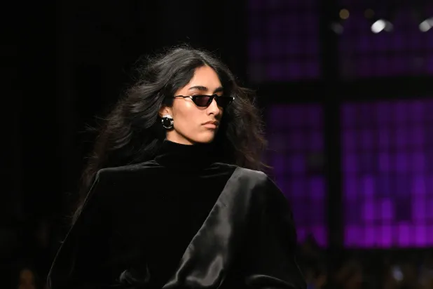  A model presents a creation by Cavalli during a fashion show as part of the Milan Fashion Week Women's collection Fall-Winter 2026-2027 in Milan on February 26, 2025. (AFP) 