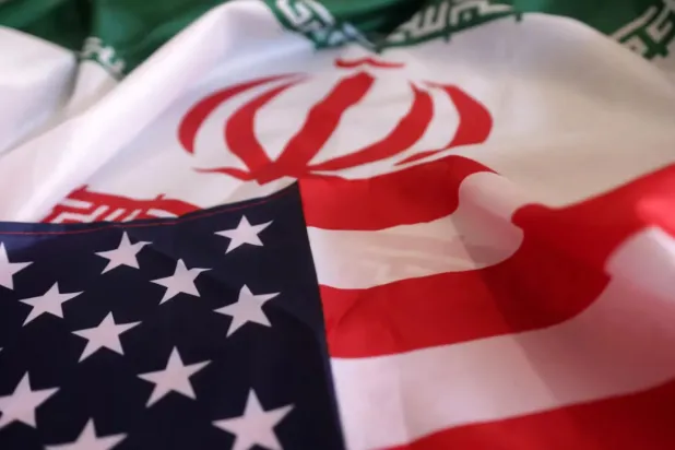 US and Iranian flags are seen in this illustration taken, September 8, 2022. REUTERS/Dado Ruvic/Illustration