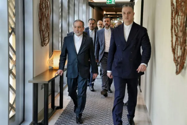 Iranian Foreign Minister Abbas Araqchi and his accompanying delegation depart for the site of the talks in Muscat, Oman, February 6, 2026. Iranian Foreign Ministry/WANA (West Asia News Agency)/ Handout via Reuters 