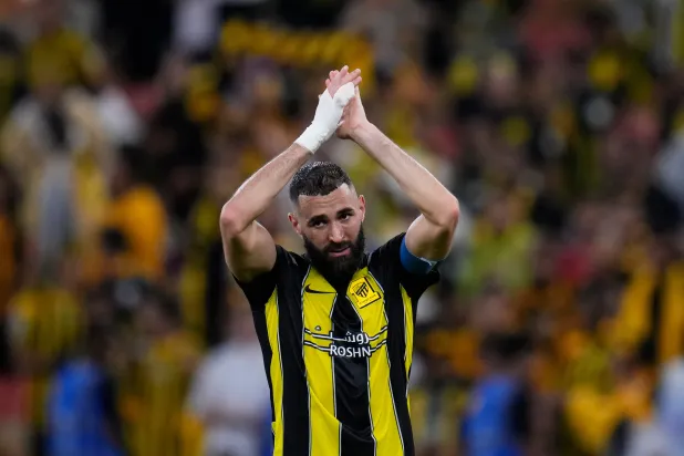 Al-Ittihad's Karim Benzema celebrates at the end of the Soccer Club World Cup first round soccer match between Al-Ittihad and Auckland City FC at King Abdullah Sports City stadium in Jeddah, Saudi Arabia, Dec. 12, 2023. (AP)