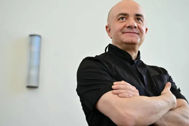 Imad Alarnab, a chef and restaurant owner who fled Syria in 2015, hosted King Charles III at his Soho restaurant. Ben STANSALL / AFP
