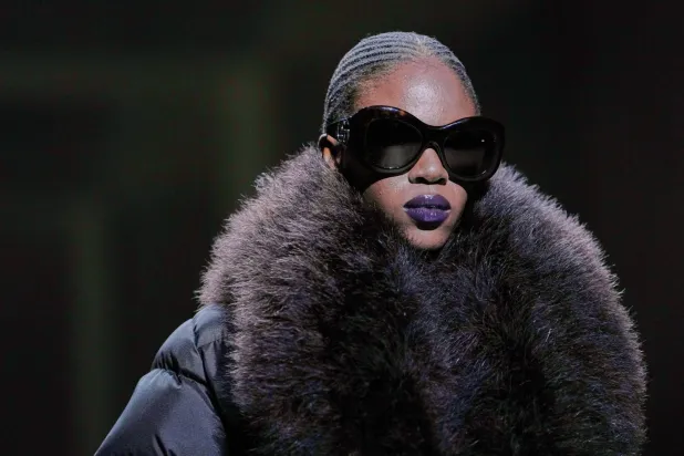  A model wears a creation from the Gucci Fall/Winter 2026-2027 Men/Women's collection, presented in Milan, Italy, Friday, Feb. 27, 2026. (AP) 