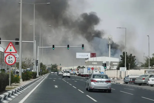  Smoke rises following reports of Iranian missile attacks on Doha (Reuters). 
