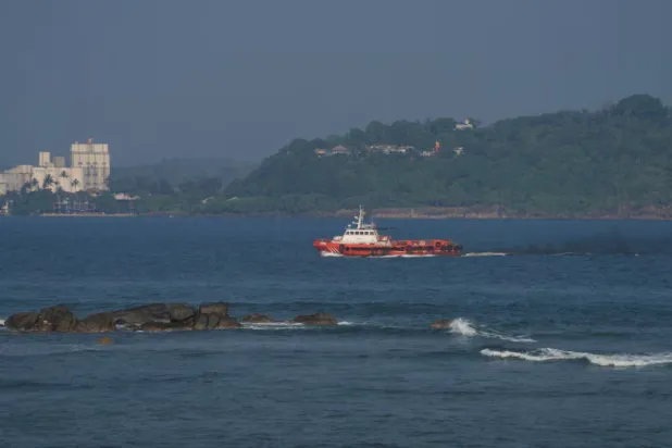 A vessel sails off the Galle coast after a submarine attack on the Iranian military ship, Iris Dena, off Sri Lanka, in Galle, Sri Lanka, March 4, 2026. REUTERS/Thilina Kaluthotage 
