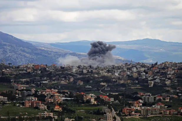 Smoke rises from the city of Khiam after an Israeli bombing targeted one of its neighborhoods, coinciding with the incursion of tanks (AFP)