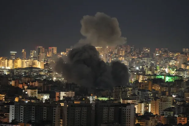 Smoke rises following an Israeli airstrike in Dahiyeh, Beirut's southern suburbs, Lebanon, Thursday, March 5, 2026. (AP Photo/Hassan Ammar)