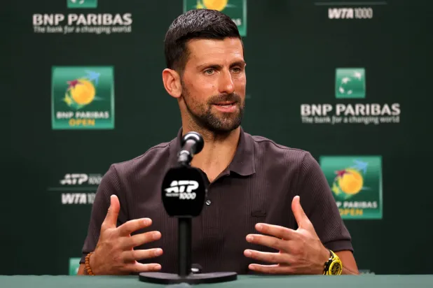 INDIAN WELLS, CALIFORNIA - MARCH 04: Novak Djokovic of Serbia fields questions form the media during Day 1 of the BNP Paribas Open at the Indian Wells Tennis Garden on March 04, 2026 in Indian Wells, California.   Matthew Stockman/Getty Images/AFP 