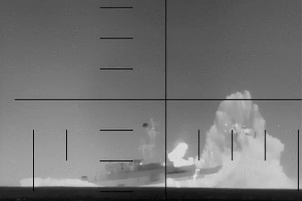 This frame grab from a video released by the US Department of Defense on March 4, 2026, shows what the Department of Defense says is periscope footage of a US Navy submarine firing on and sinking an Iranian warship in the Indian Ocean. (Photo by US Department of Defense / AFP)
