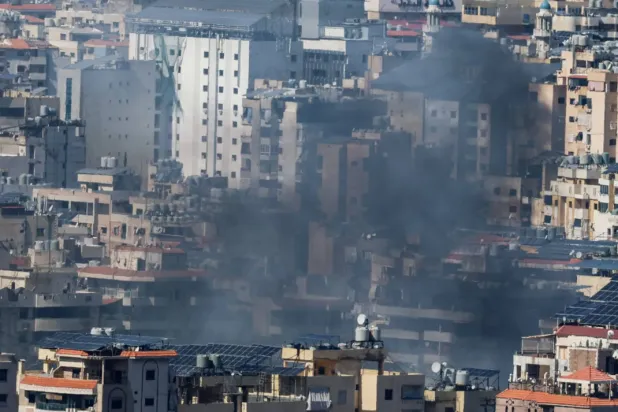 Smoke rises after an Israeli airstrike on the southern suburbs of Beirut (Reuters)