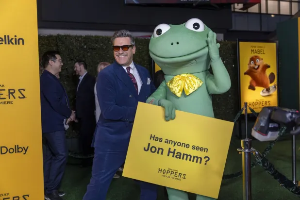 US actor Jon Hamm (L) poses with Tom Lizard as he arrives for the world premiere of Disney and Pixar's film 'Hoppers' at the El Capitan Theater in Los Angeles, California, USA, 23 February 2026.  EPA/JILL CONNELLY