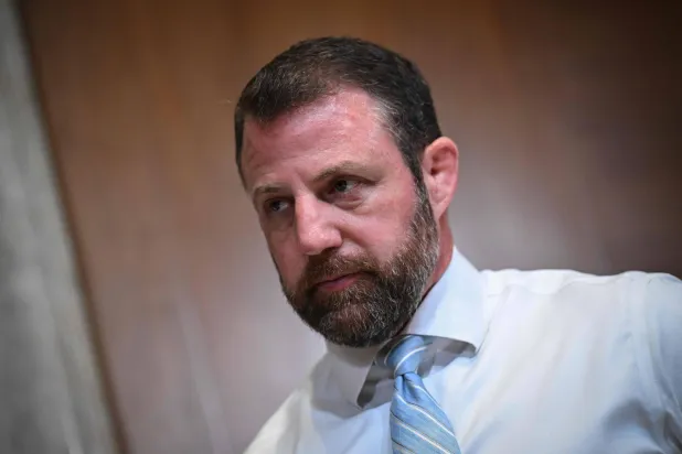 (FILES) Subcommittee chairman US Senator Markwayne Mullin, Republican from Oklahoma, looks on before the start of a Legislative Branch Subcommittee hearing on "A Review of the FY2026 Budget Requests for the Congressional Budget Office, the Government Accountability Office, and the Government Publishing Office" at the US Capitol in Washington, DC on April 29, 2025. (Photo by Drew ANGERER / AFP)