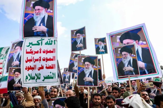 Crowds of Houthis in Sanaa raise portraits of Iranian Supreme Leader Ali Khamenei after his killing (Reuters) 