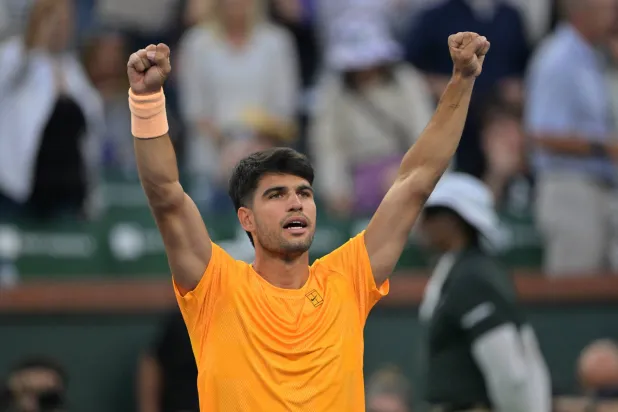 Mar 7, 2026; Indian Wells, CA, USA;  Carlos Alcaraz (ESP) reacts to the crowd after defeating Grigor Dimitrov (BUL) in his second round match during the BNP Paribas Open at the Indian Wells Tennis Garden. Mandatory Credit: Jayne Kamin-Oncea-Imagn Images