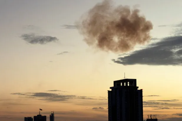 Smoke rises after an Iranian drone was intercepted in Manama, Bahrain, March 6, 2026. Picture taken on a mobile phone. REUTERS/Stringer