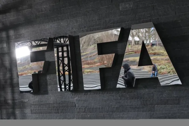 13 December 2024, Switzerland, Zurich: FIFA's logo is seen at FIFA headquarters ahead of the draw ceremony for the 2026 World Cup qualifiers in Zurich. (dpa)